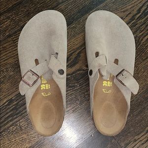 Birkenstock’s. Never been worn